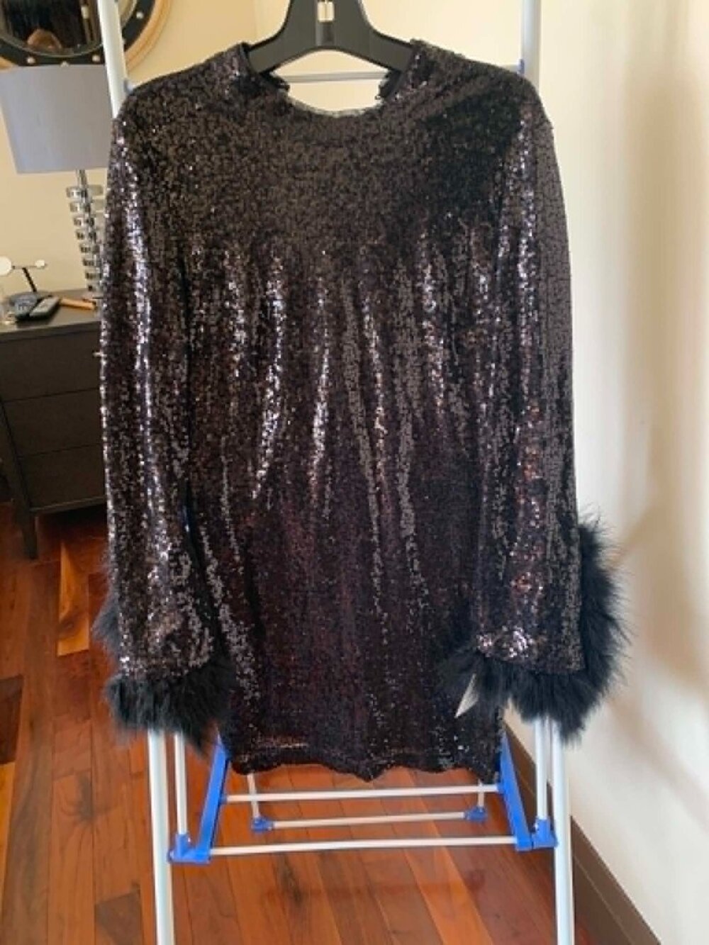 Black sequin dress with feathers